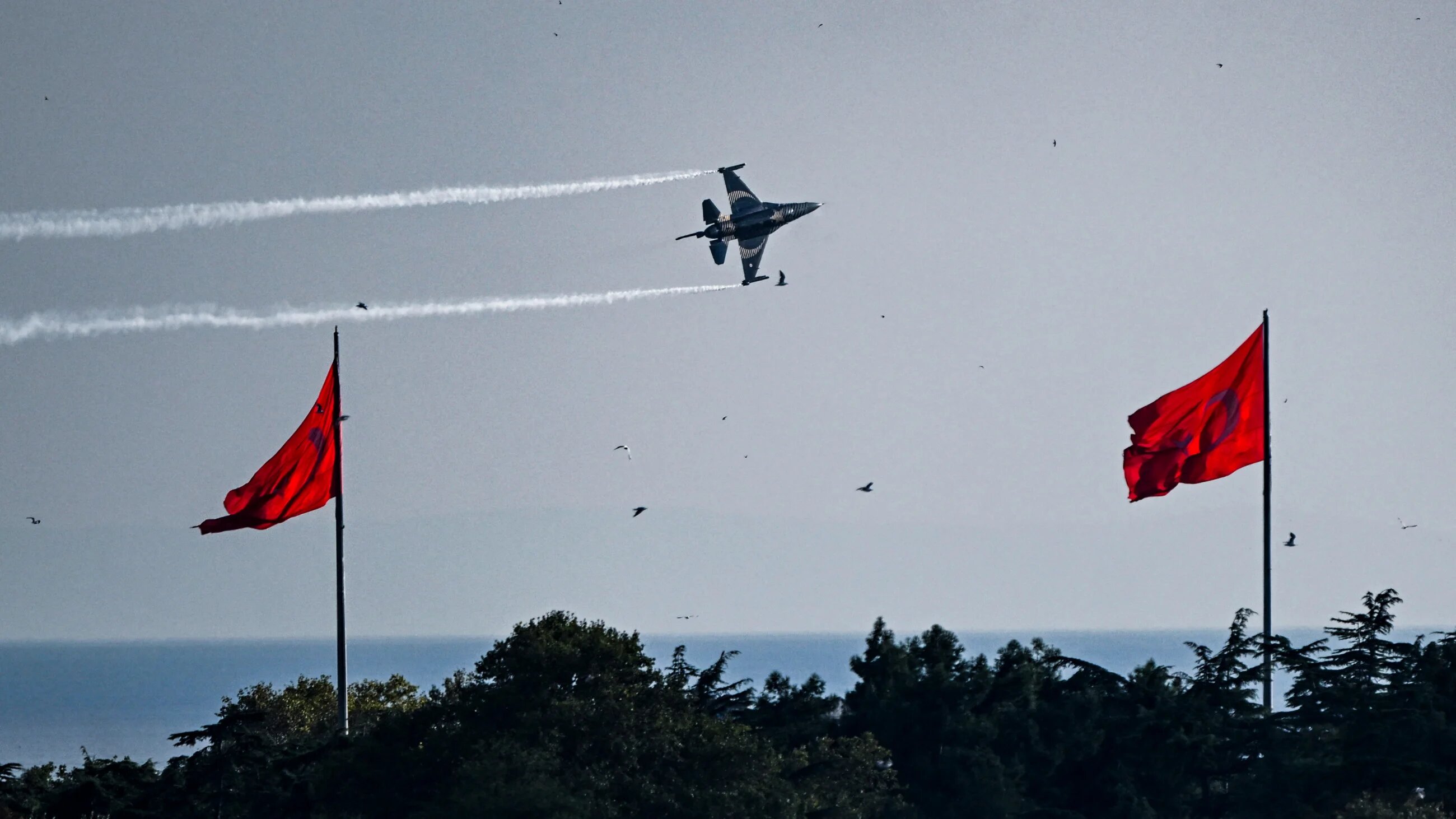Turkish Air Force performs a demonstration flight over Istanbul's Sultanahmet Mosque marking the 102nd anniversary of the Victory Day in Istanbul on August 30, 2024 (AFP)