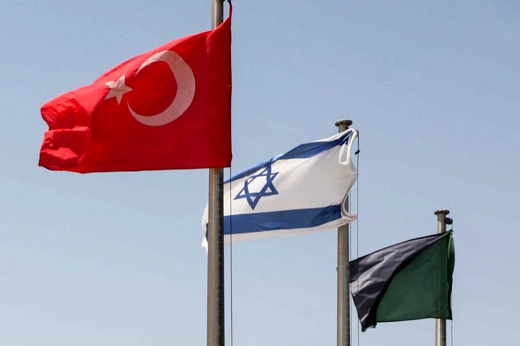 The flags of Turkey, Israel and the Israeli army armoured corps fly at the Yad La-Shiryon Tank Museum in Latrun, about 30km west of Jerusalem, in August 2022