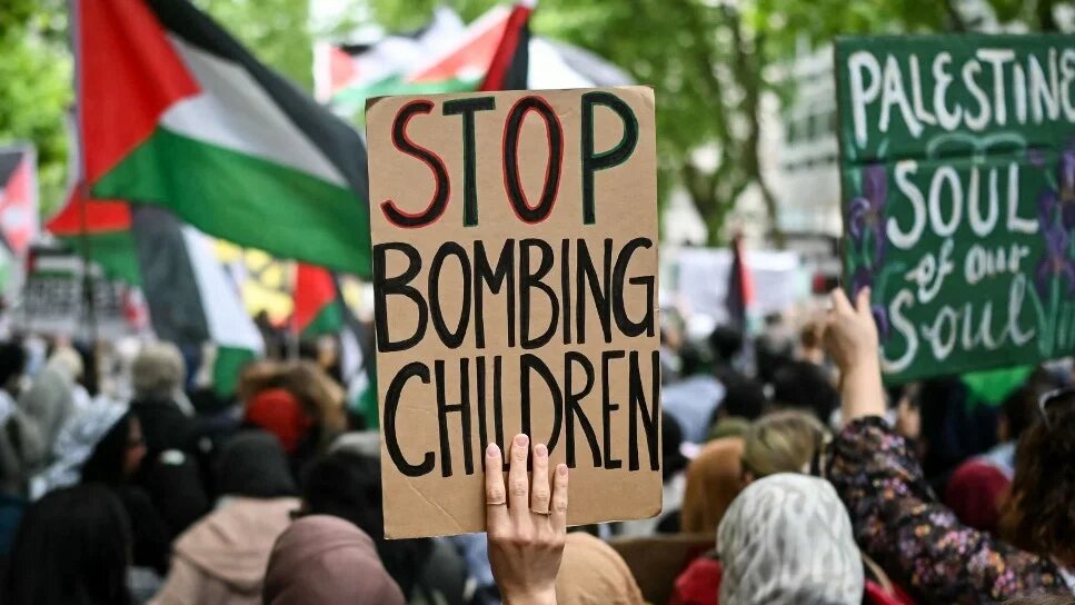 Protesters hold a march for Gaza in central London on 8 June 2024 (Justin Tallis/AFP)