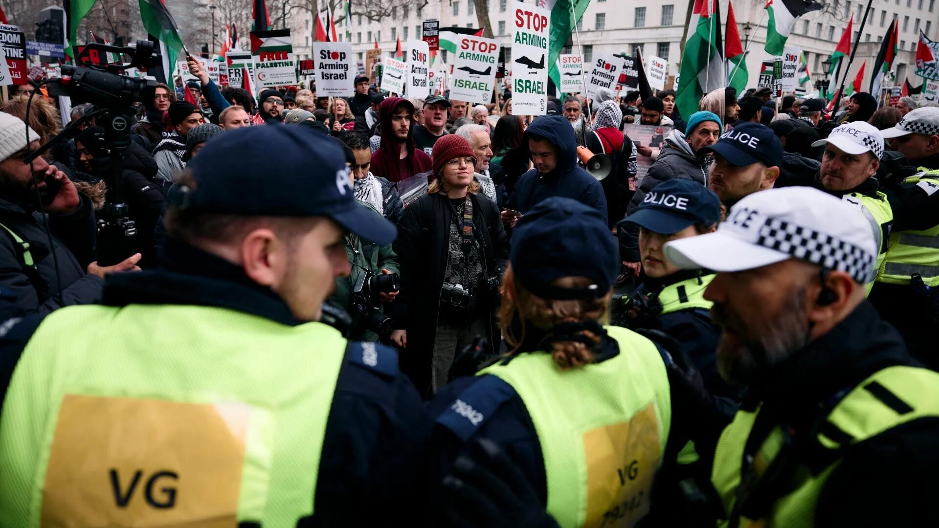Protesters face a line of police officers in central London during a demonstration for Palestine on 18 January 2025 (Benjamin Cremel/AFP)
