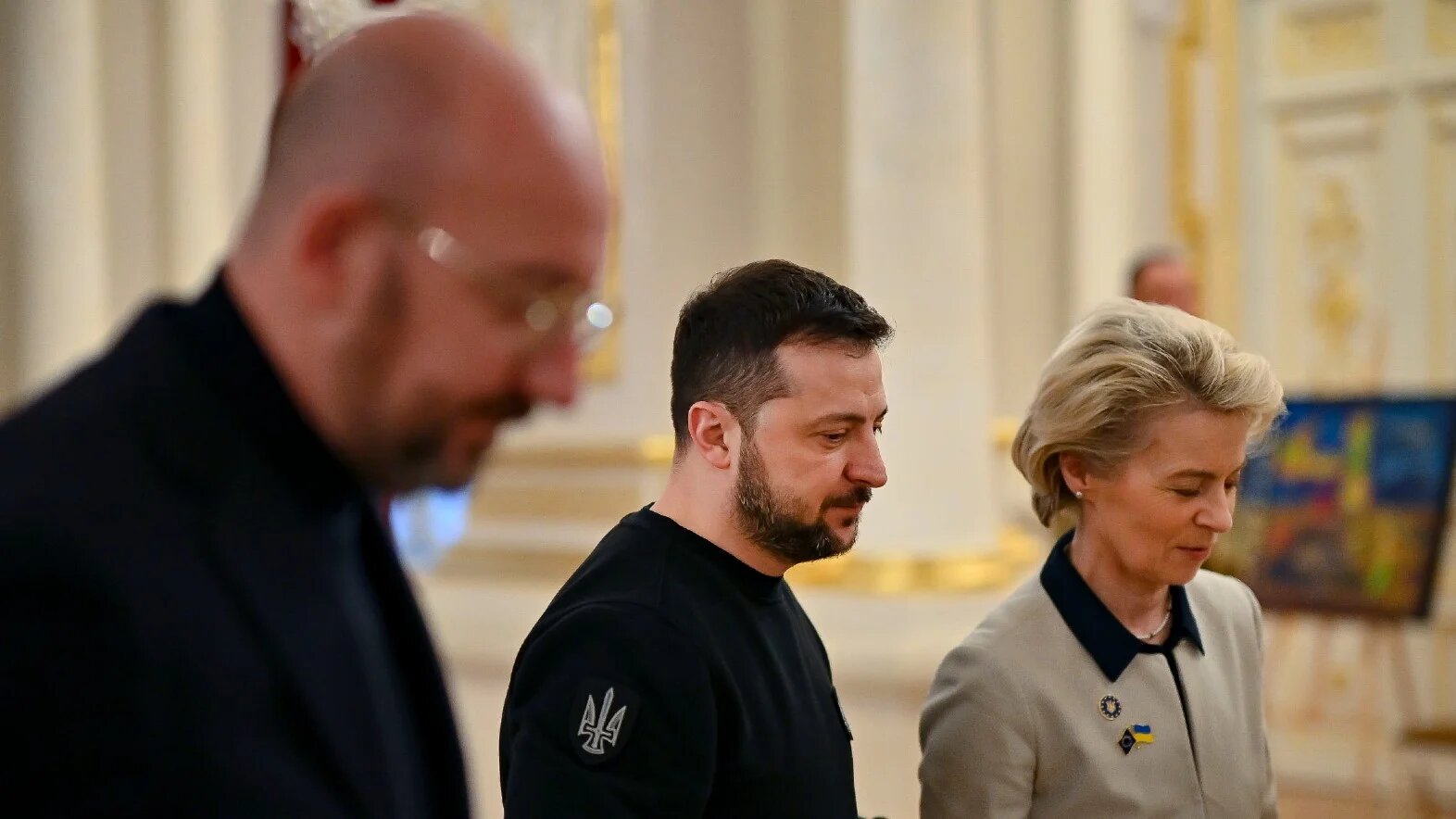 Ukrainian President Volodymyr Zelenskyy, center, welcomes European Council President Charles Michel, left, and European Commission President Ursula von der Leyen in Kyiv on 3 February, 2023 (AP)
