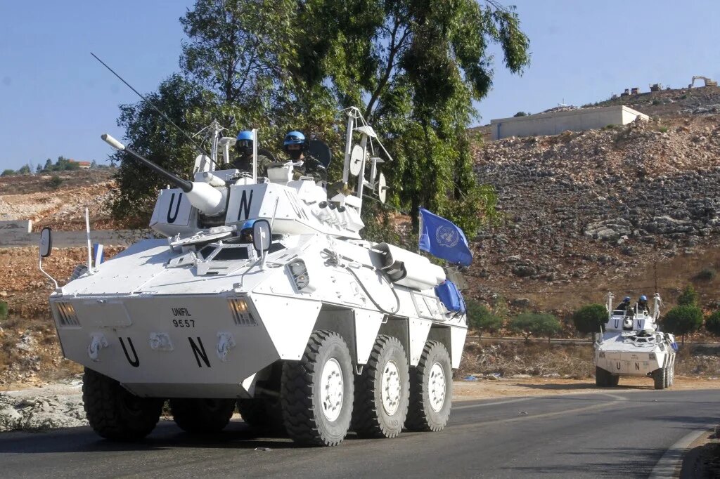 A UN peacekeeping force patrol near the southern Lebanese border with Israel on 26 August.