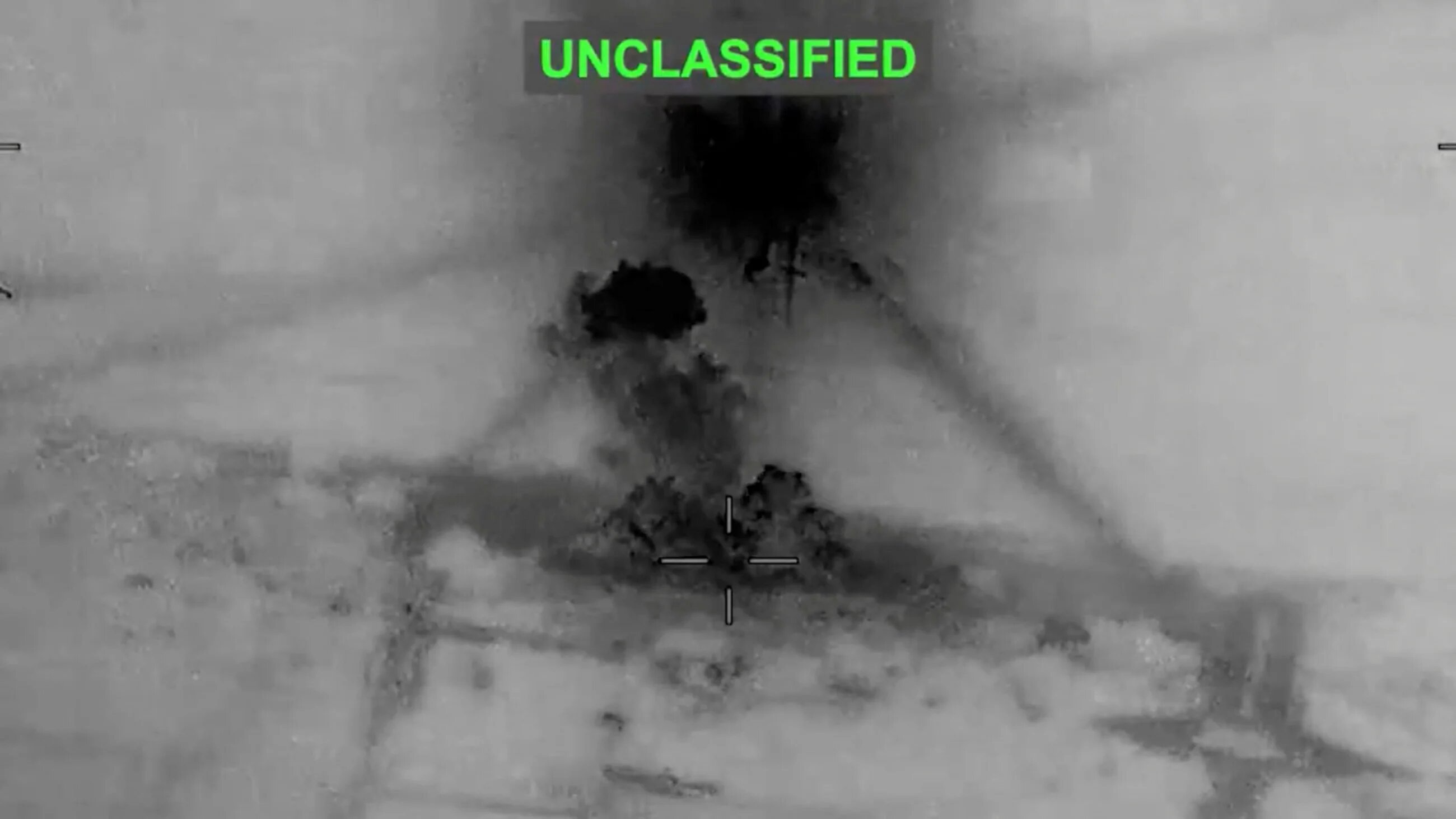 Smoke rises from explosions after US Central Command said it carried out strikes on Iran in response to an Iranian drone strike on a cargo ship in the Strait of Hormuz in a video released on 26 June 2026 (US Central Command/Handout via Reuters)