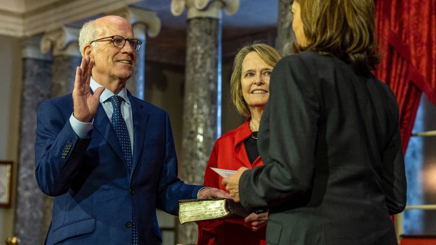 US Vice President Kamala Harris swears in Senator Peter Welch in the old senate chamber for the Ceremonial Swearing on 3 January 2023 in Washington.