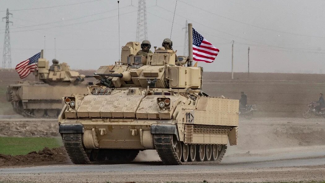 US forces patrol for children of suspected Islamic State group in the town of Tel Maaruf in Syria's northeastern Hasakeh province on 15 December 2022.