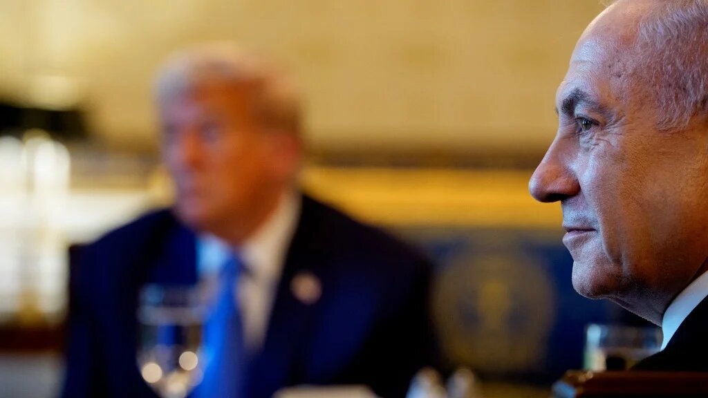 US President Donald Trump and Israeli Prime Minister Benjamin Netanyahu attend a dinner in the Blue Room of the White House on 7 July 2025 (Andrew Harnik/Getty Images/AFP)
