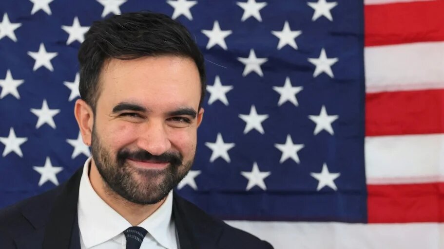 Days after being elected mayor of New York City, Zohran Mamdani serves meals at a Veteran’s Day event in the Bronx on 11 November 2025 (Michael M Santiago/Getty Images/AFP)
