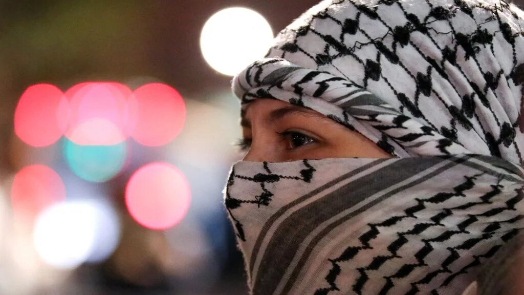 Pro-Palestinian student protesters demonstrate at the entrance gates of Columbia University in New York City on 30 April 2024 (Leonardo Munoz/AFP)
