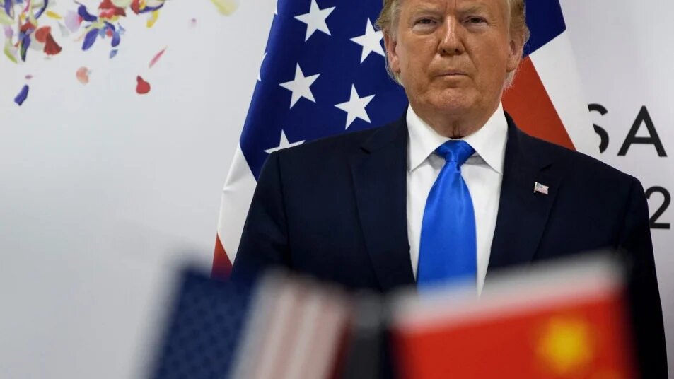 US President Donald Trump and Chinese President Xi Jinping, not pictured, attend a bilateral meeting on the sidelines of the G20 Summit in Osaka, Japan, in June 2019 (Brendan Smialowski/AFP)