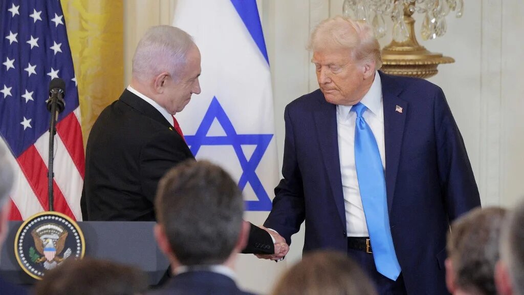 Israeli Prime Minister Benjamin Netanyahu and US President Donald Trump shake hands at the White House on 4 February 2025 (Chip Somodevilla/Getty Images/AFP)