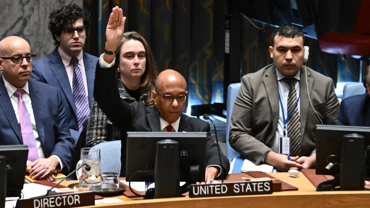 US Alternate Ambassador to the UN Robert Wood raises his hand to veto a resolution calling for a ceasefire in Gaza at UN headquarters in New York City on 20 November 2024.