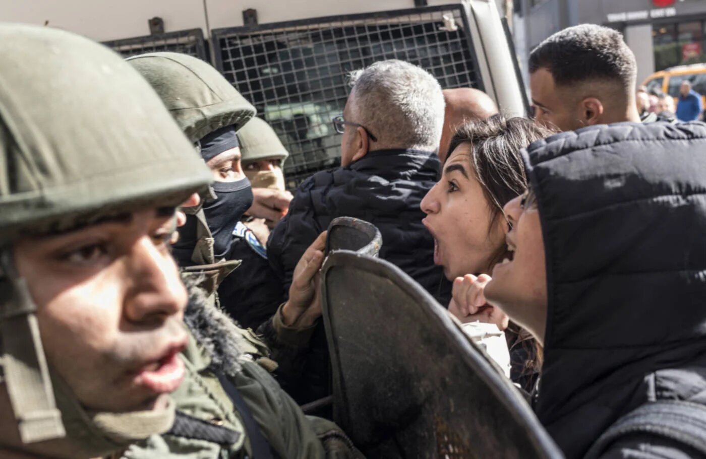 Demonstrators clash with Palestinian security forces in Ramallah, West Bank, in January 2024 (AFP)