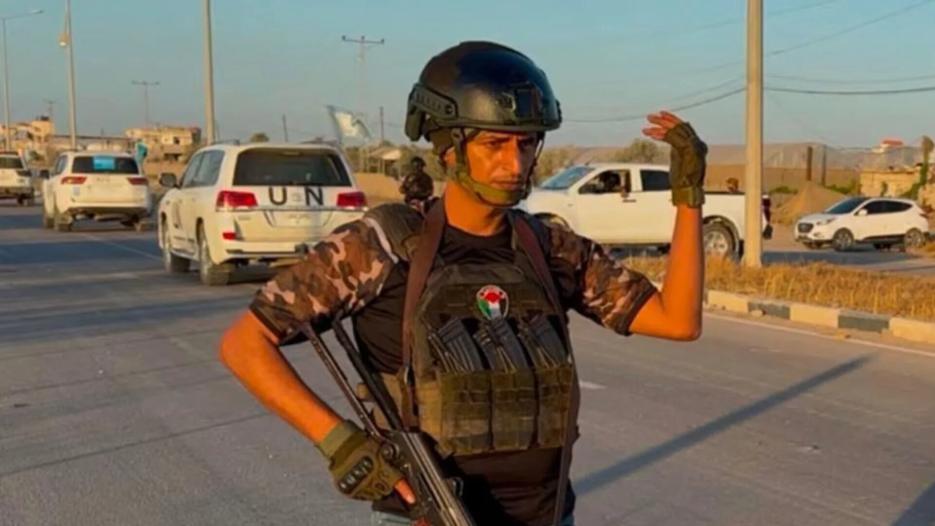 Yasser Abu Shabab holding a gun in an image posted on the Popular Forces social media account (Facebook/Screengrab)