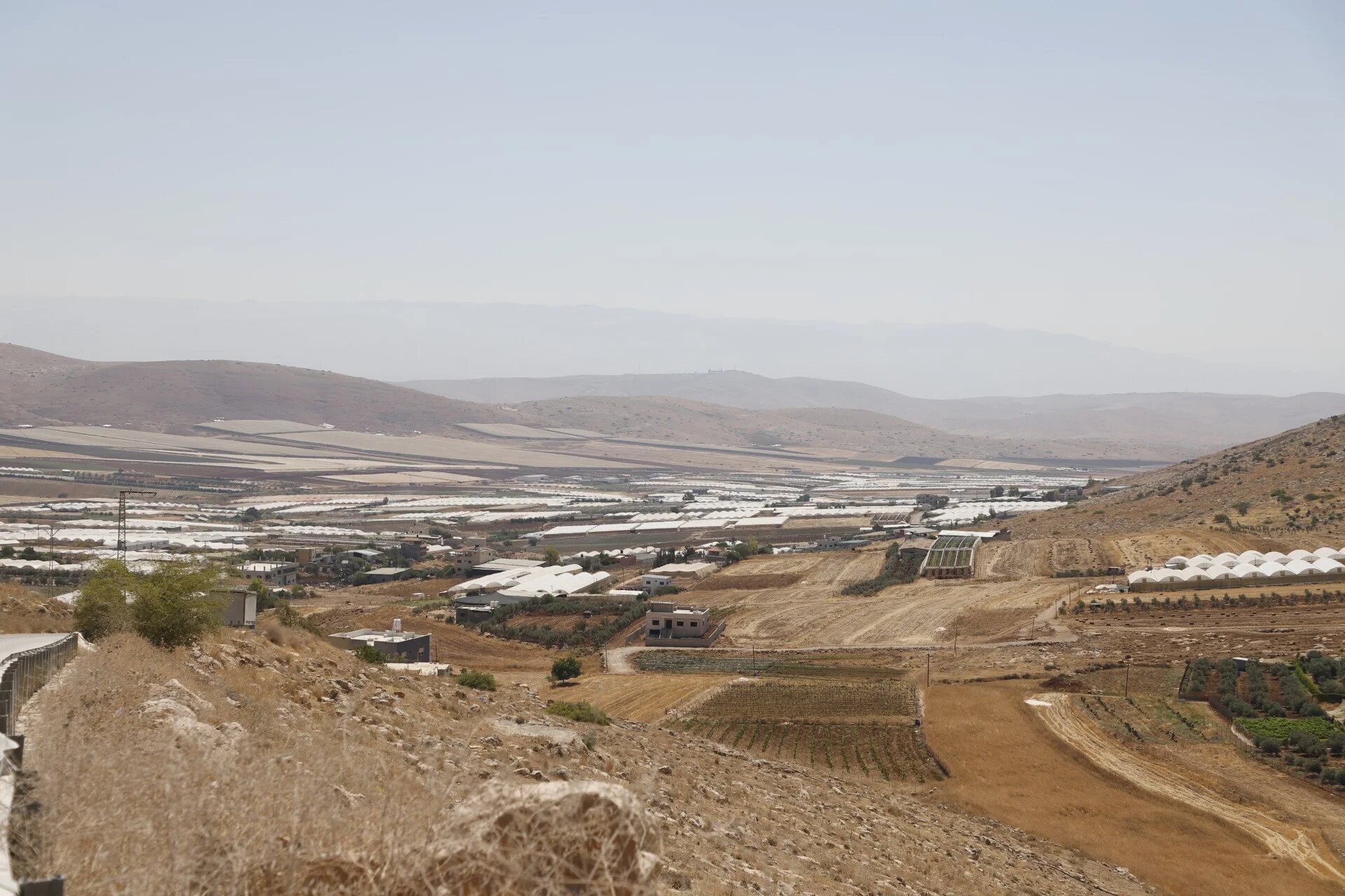 Palestinian farmers in the Jordan Valley have been forced to flee their lands, known as the 'breadbasket of Palestine' as Israel accelerates construction of another separation wall (Muhammad Ateeq/MEE)
