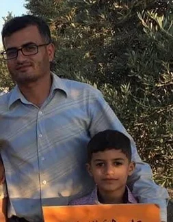 The author is pictured with his son, Abdullah (Supplied photo)