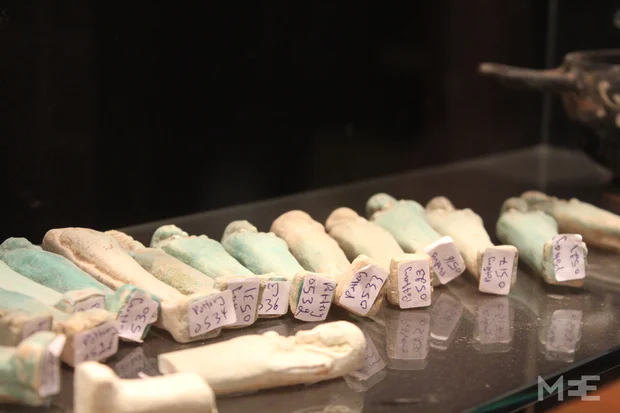 Customers can see the registration numbers of antiquities in Rami Baidun's Old City shop (MEE/Mary Pelletier)