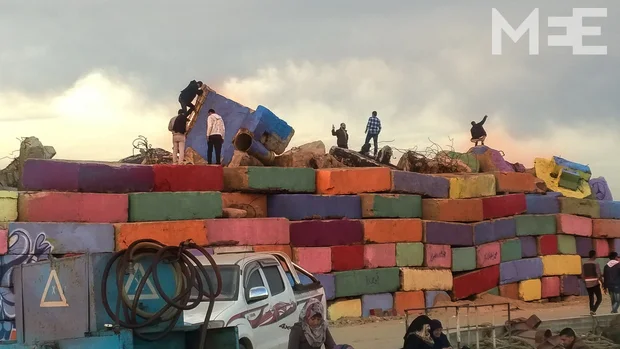 People often scale the newly-painted concrete slabs for a better view of the sunset (MEE/Creede Newton)