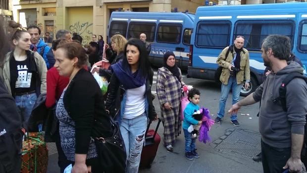 Migrants and Italians alike are evicted from the Bologna building where they had lived (MEE/Farhad Mirza)