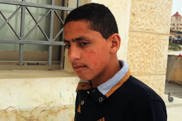 Mohammed Abu Shamsiyyeh, 14, has had nightmares since he witnessed the shooting alongside his father who was filming. (MEE/Abed al Qaisi)