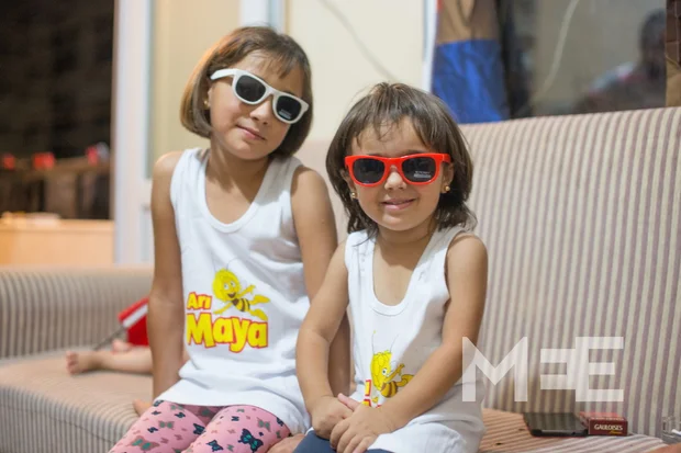 Sivan with her little sister. Sivan is 10 years old, has never been to school and can not read or write (MEE/Xander Stockmans)