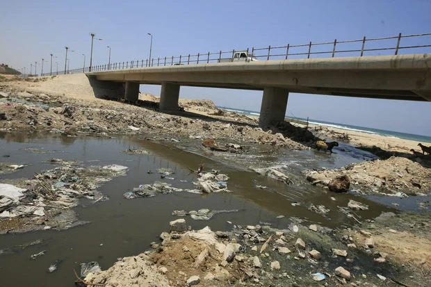 The dangerous sewage situation is likely to exasperated by the bombing (AFP) 