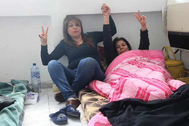 The hunger strikers - 13 men and three women - have not consumed anything but sugar cubes, water and tea since 16 March (MEE/Thessa Lageman)