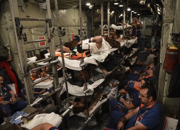 Palestinians on board Turkey-bound aid aeroplane (AA) 