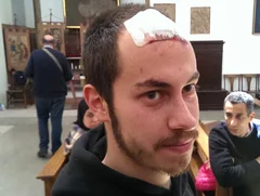 Federico Fornasari, USB union activist, led protest in street until police charged and he sought refuge in church (MEE/Farhad Mirza)