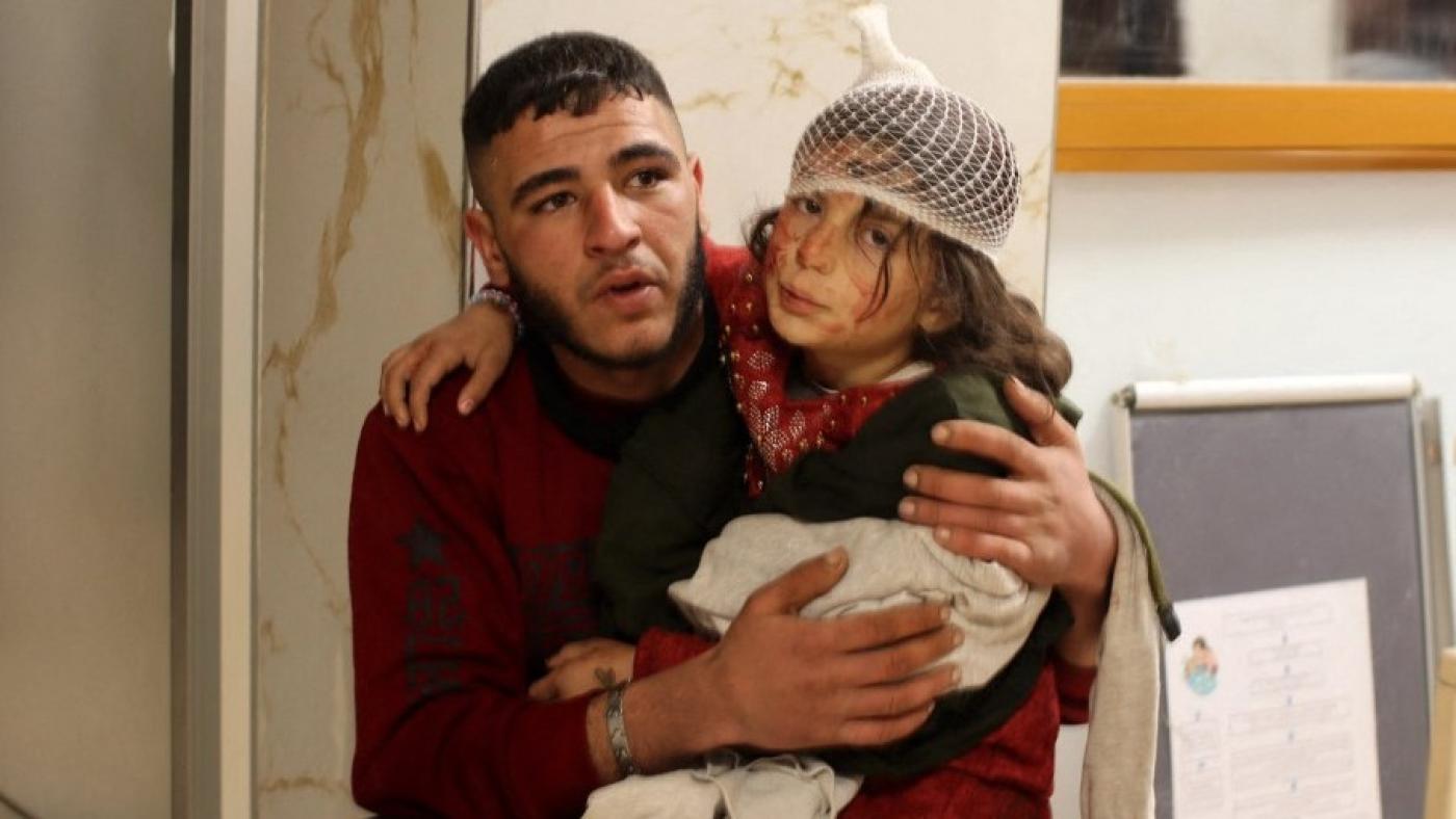 syrian girl waits for treatment after earthquake