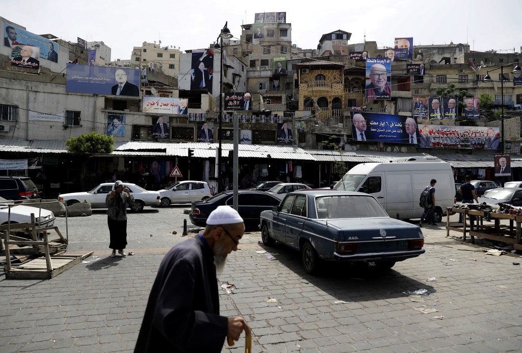 Tripoli’s adjacent Bab al-Tabbaneh and Jabal Mohsen neighbourhoods are pictured on 3 May 2018 (AFP)