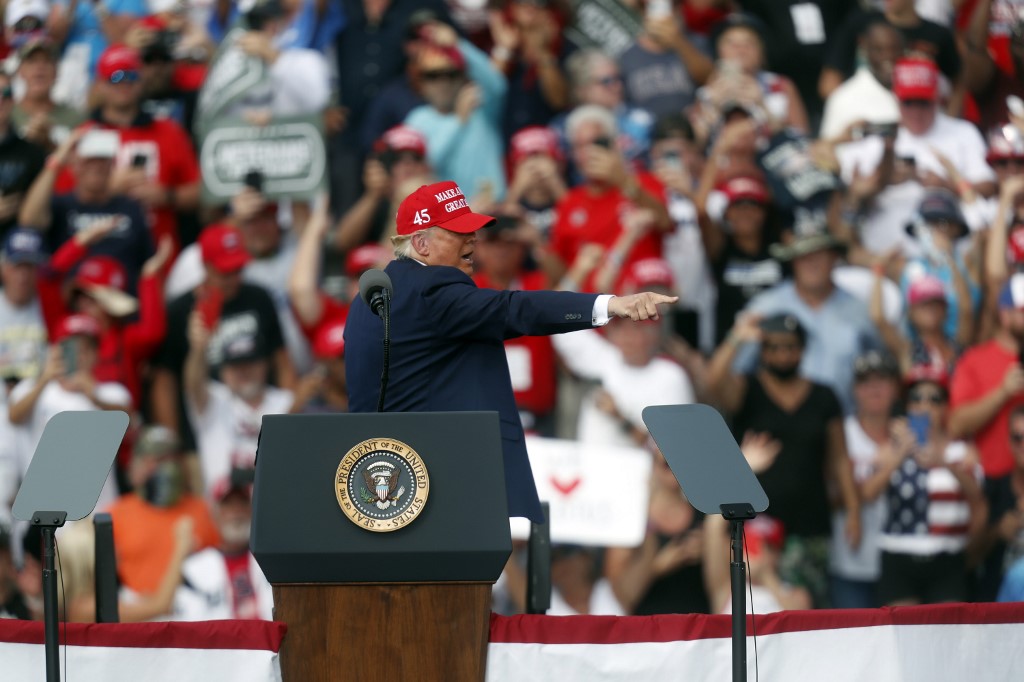 US President Donald Trump speaks in Florida on 29 October (AFP)