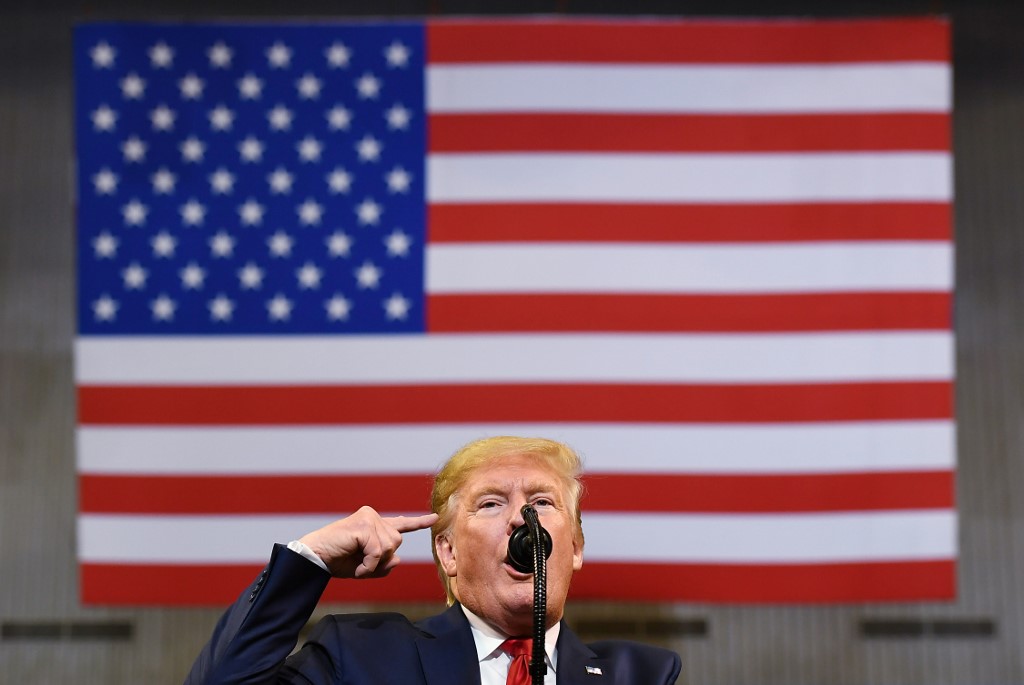 US President Donald Trump speaks in Louisiana on 14 November (AFP)