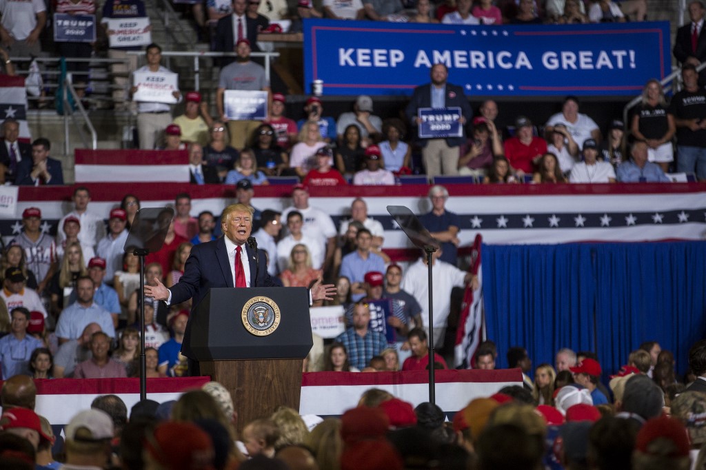 US President Donald Trump speaks at a rally in North Carolina on 17 July (AFP)