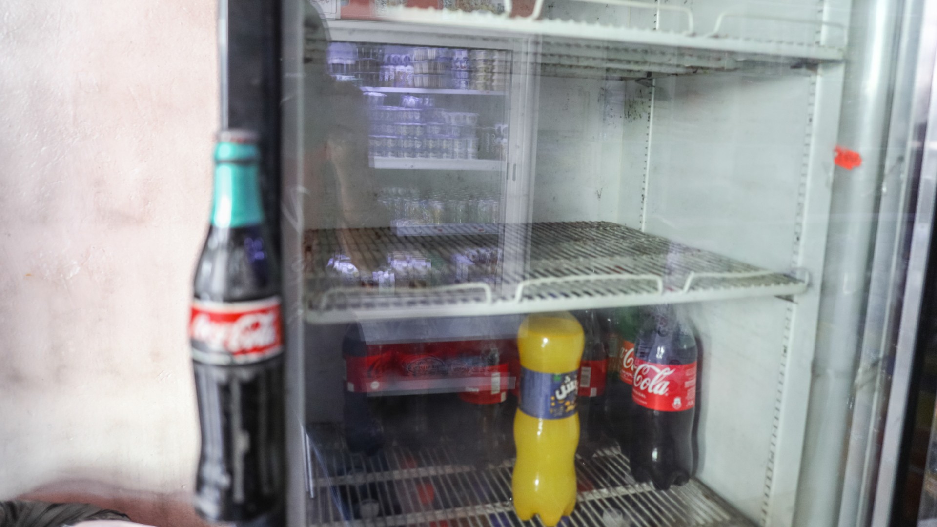 A fridge at a grocery shop in Ariana, in the Tunisian capital Tunis, can be seen without bottled water on 9 September 2026 due to declining stocks and supply disruptions (Chedly Ben Ibrahim/NurPhoto/Reuters)