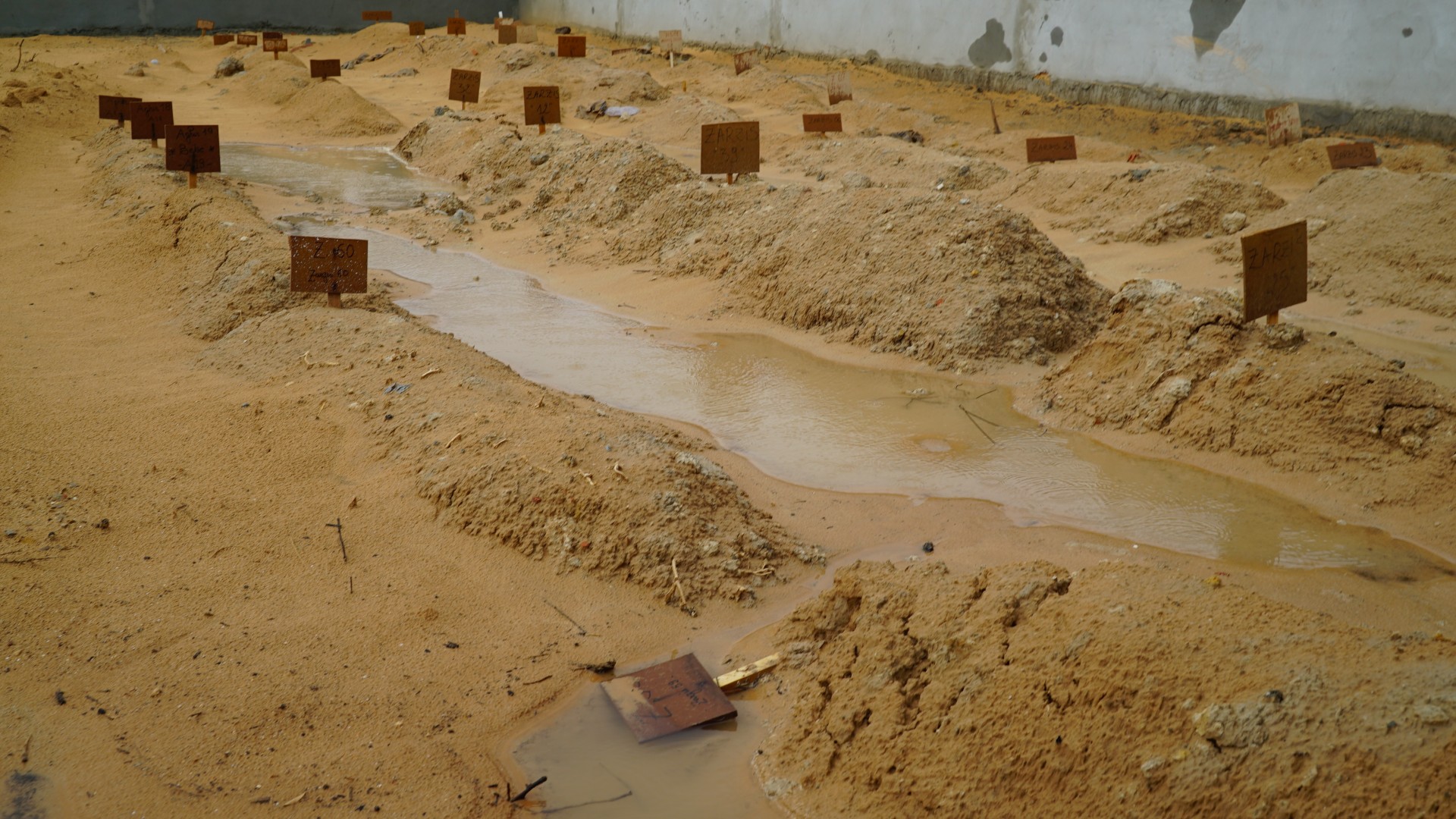 Hundreds of unnamed men, women and children who died trying to cross the Mediterranean to seek a new life in Europe have been buried in unmarked graves in Zarzis (MEE/Faisal Edroos)