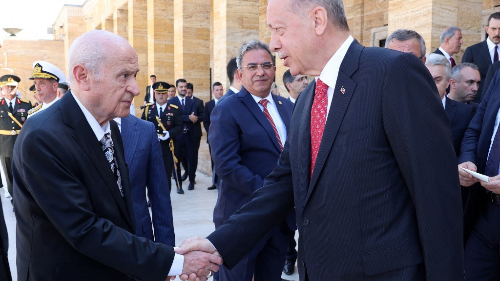 MHP leader Devlet Bahceli and Turkish President Recep Tayyip Erdogan are pictured in Ankara on 30 August 2022 (Adem Altan/AFP)