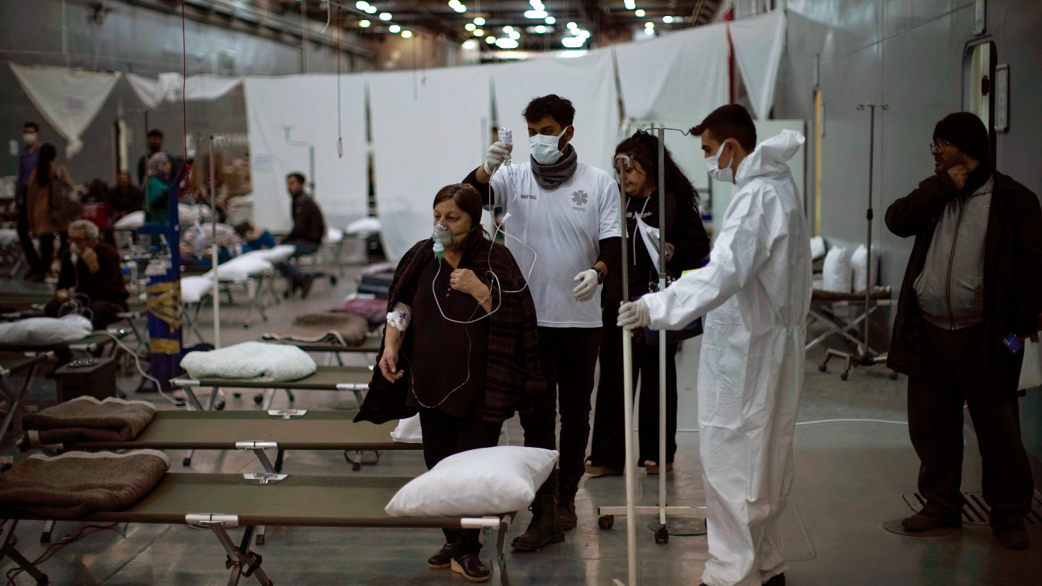Patients affected by the earthquake are seen by medical personnel in a makeshift hospital set up at Turkish Bayraktar warship anchored in a port near Iskenderun city, southern Turkey, Tuesday, Feb. 14, 2023.