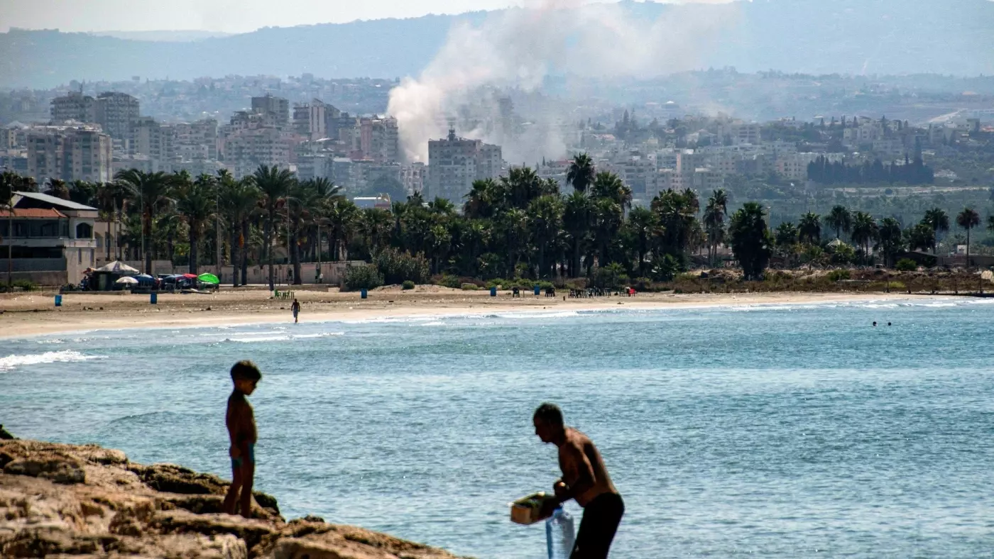 smoke erupts Tyre Israeli strike