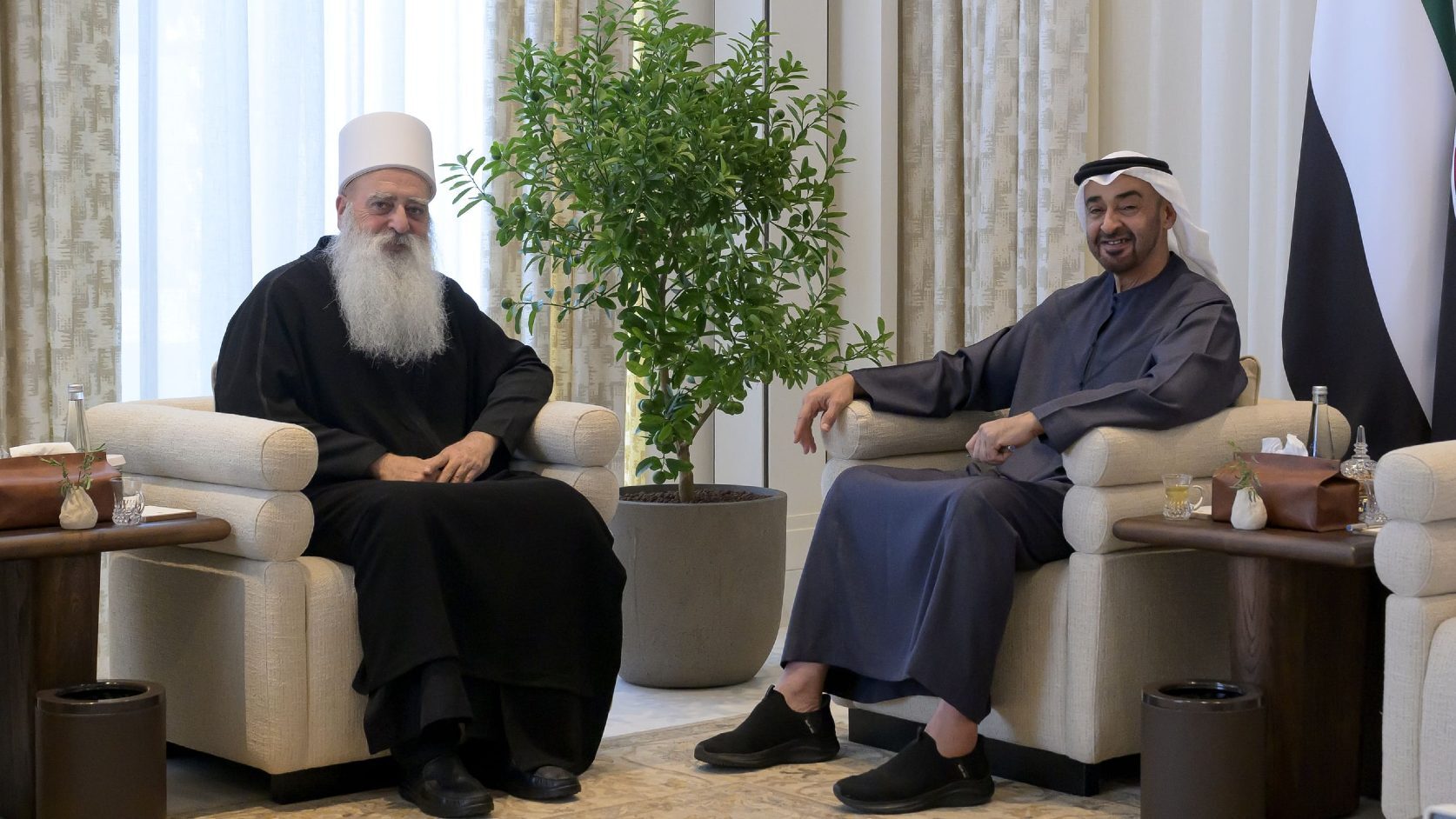 Sheikh Mowafaq Tarif (L), the spiritual leader of Israel's Druze community, met UAE President Mohammed bin Zayed in Abu Dhabi on 7 December (WAM)