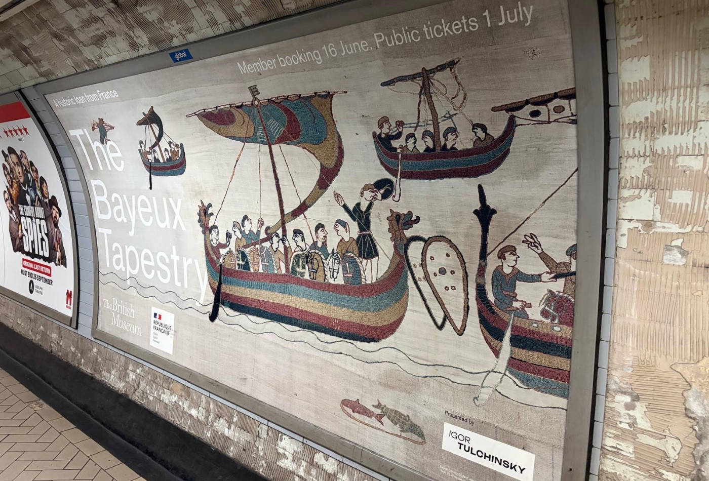 An advertisement for the British Museum's Bayeux Tapestry exhibition on the wall of a London Underground station on 4 September 2026 (MEE)