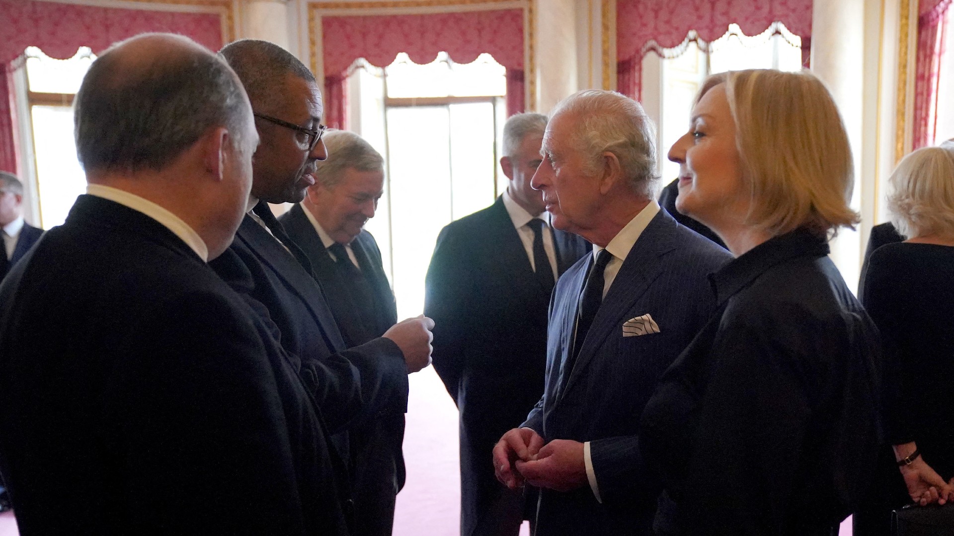 King Charles III (centre right) has an audience with Prime Minister Liz Truss (R) and members of her Cabinet in the 1844 Room, at Buckingham Palace in London on September 10, 2022. 