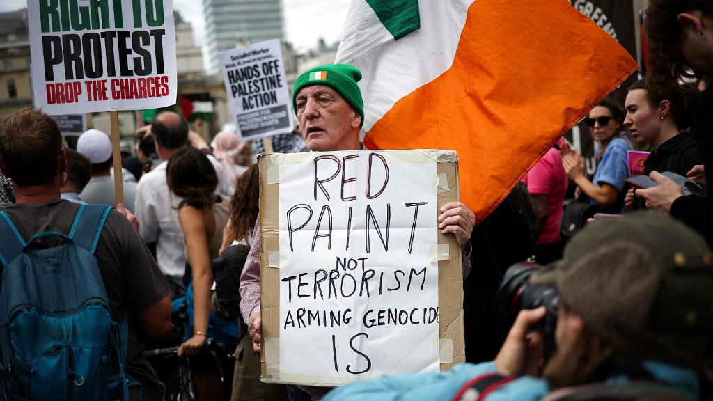 Protesters rally in support of Palestine Action in London on 23 June 2025 (Henry Nicholls/AFP)