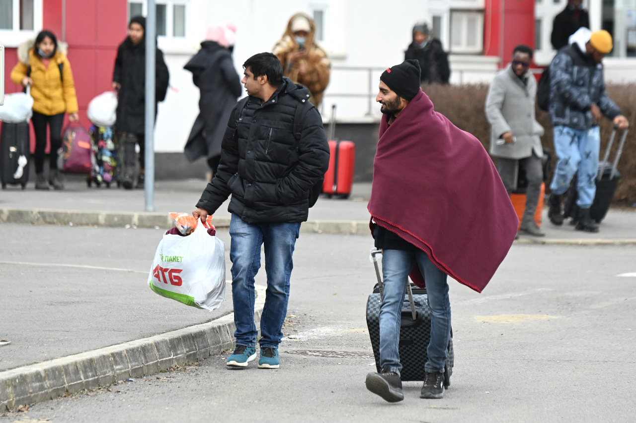 Fleeing from Kyiv, university students from India cross the border by foot in Barabas, Hungary, on February 28 2022
