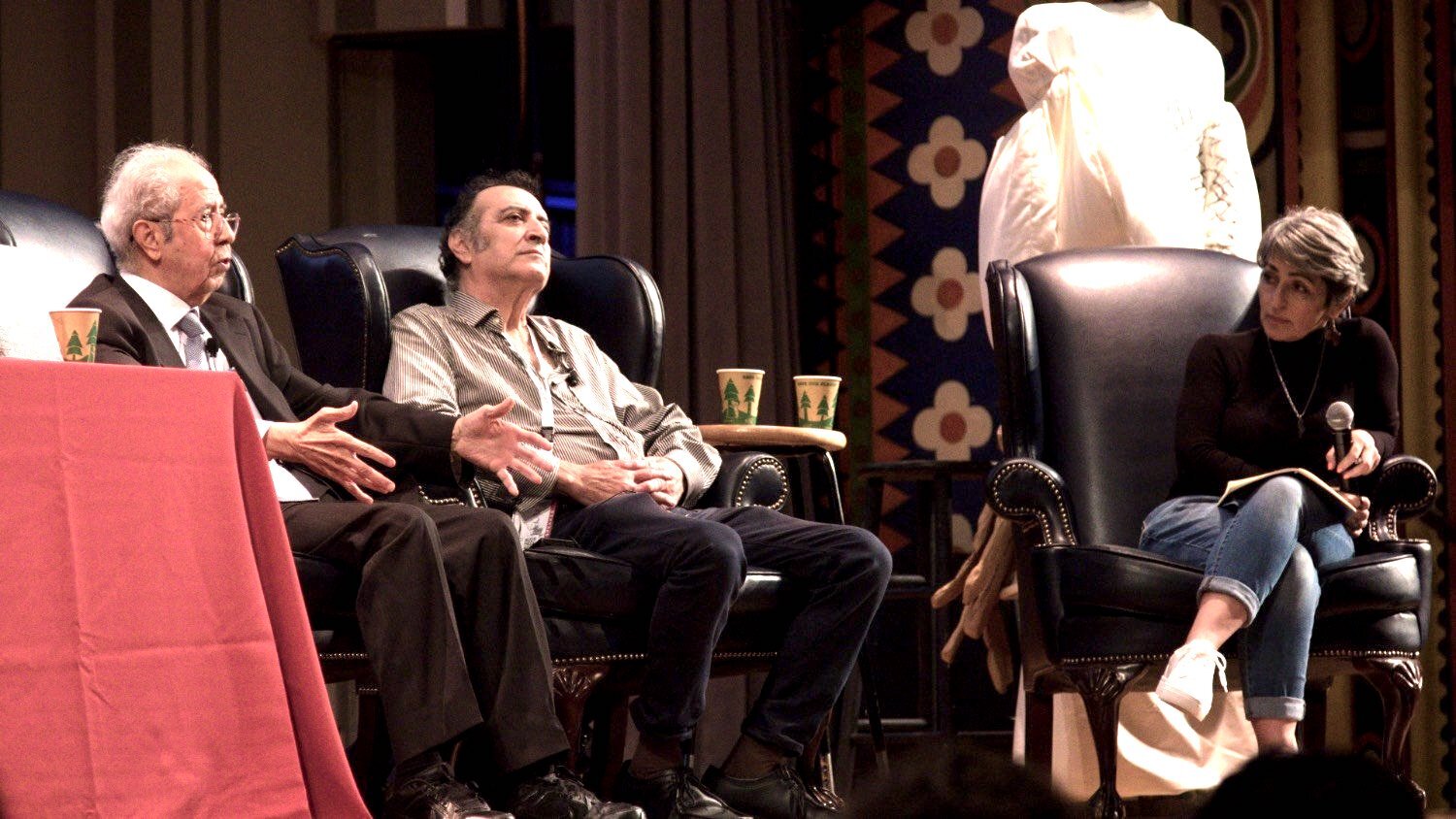 Palestine Writes executive director Susan Abulhawa (R) speaks with Palestinian researcher Salman Abusitta (L) and professor Nur Masalha (C) during a panel session.