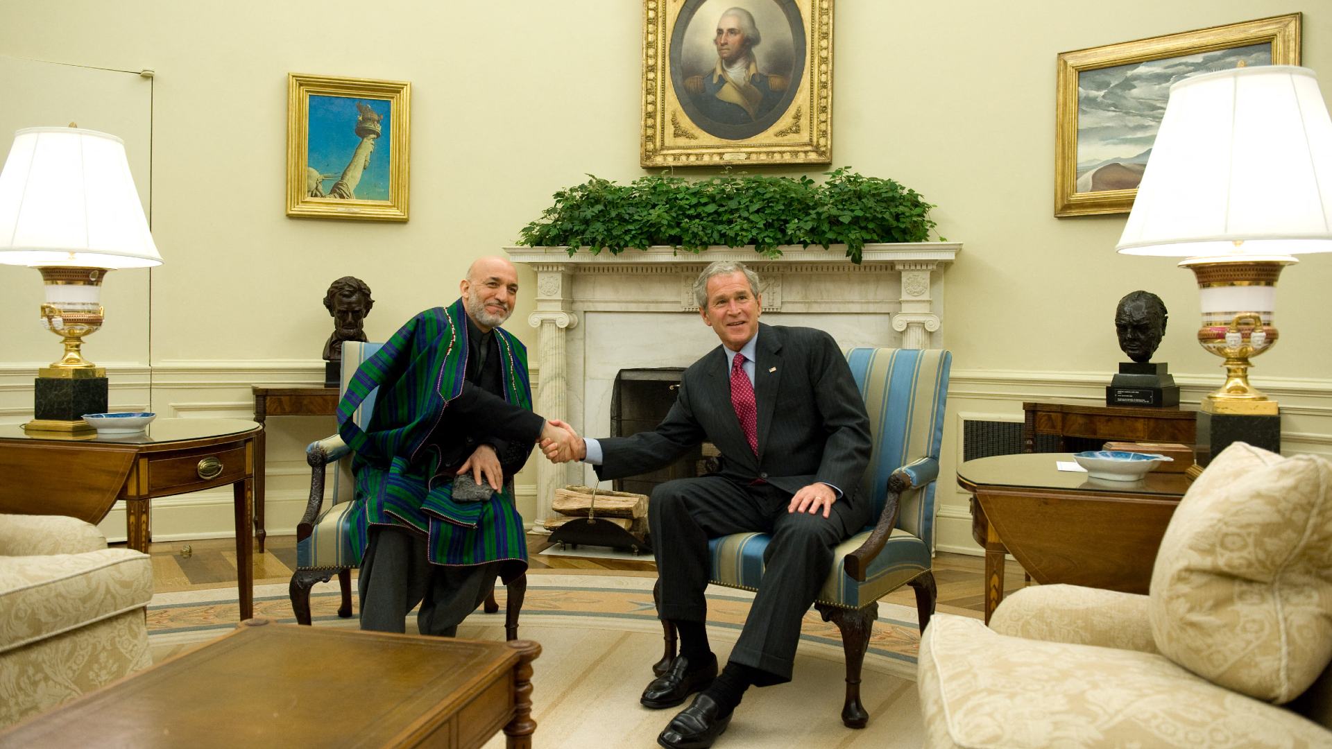 US President George Bush (R) hosts Afghan counterpart Hamid Karzai at the White House in 2008 (AFP)