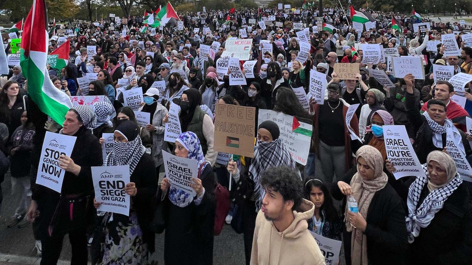 Demonstrators rally in Washington DC on 21 October to demand Israel end its siege on Gaza.