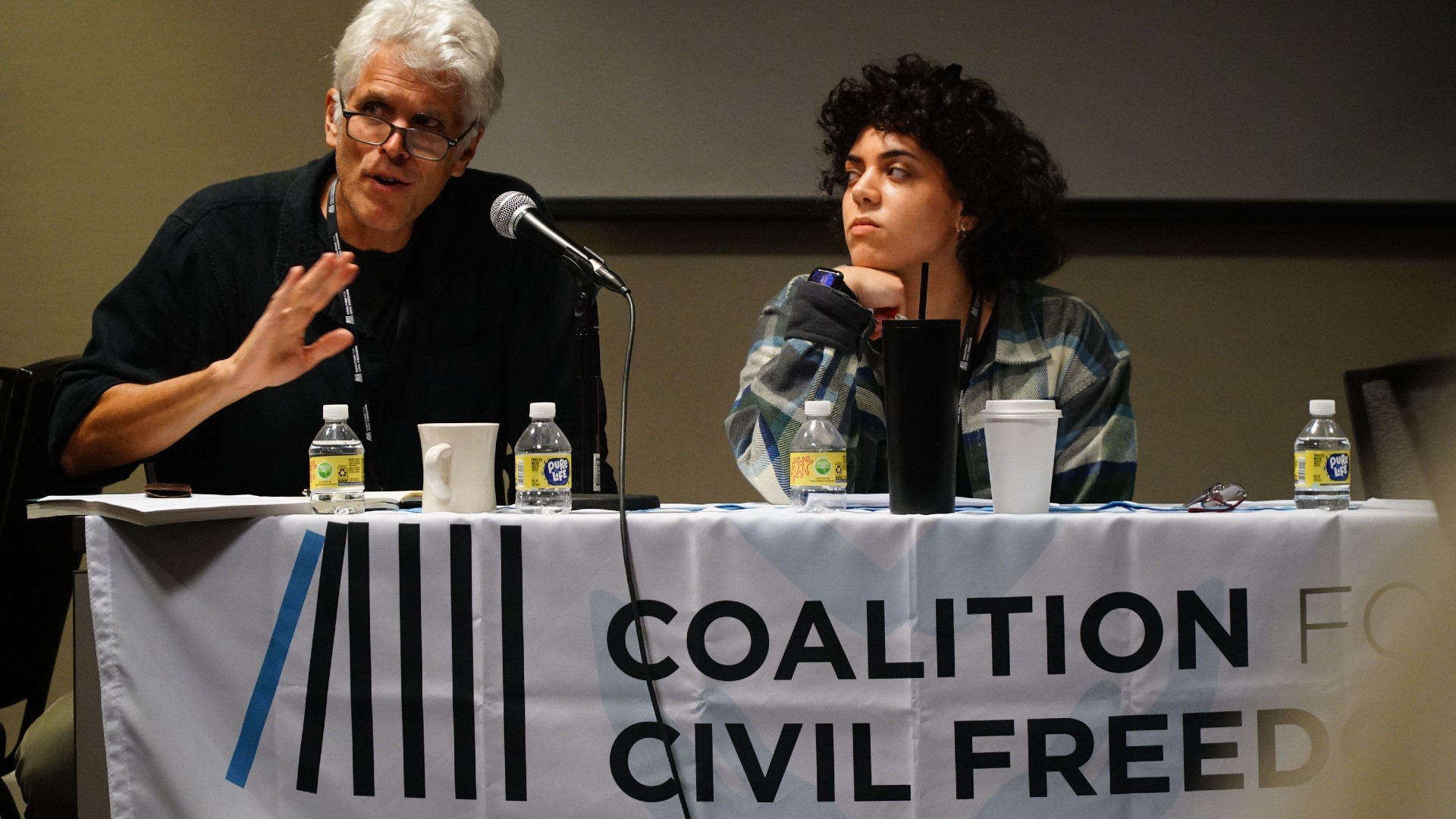 Acclaimed filmmaker Dave Riker and CCF's Nada workshop with families on ways to tell their stories (MEE/Azad Essa)