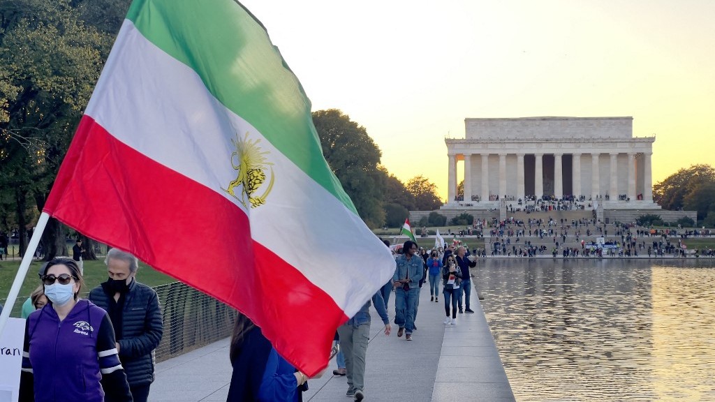 Demonstrators in Washington march in solidarity with protesters in Iran on 29 October 2022 (AFP)