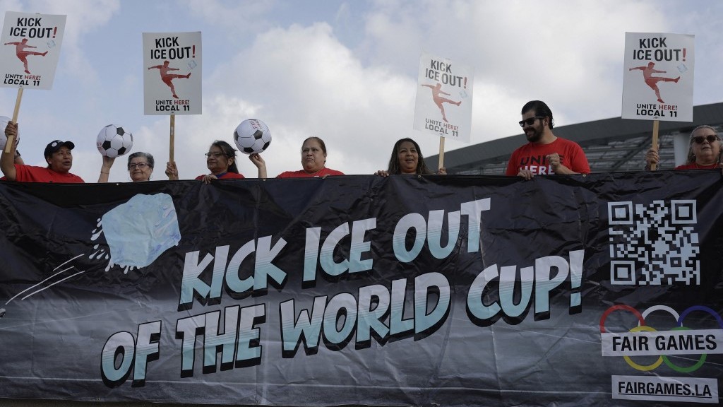INGLEWOOD, CALIFORNIA - MAY 18: Union workers hold signs as they rally outside of SoFi Stadium with California Democratic gubernatorial candidate Tom Steyer on May 18, 2026, in Inglewood, California. California gubernatorial candidate Tom Steyer joined labor advocates and union workers at SoFi Stadium during a rally ahead of the 2026 FIFA World Cup to demand investigations into FIFA’s security and worker accreditation policies, while also calling for protections against immigration enforcement activity and 
