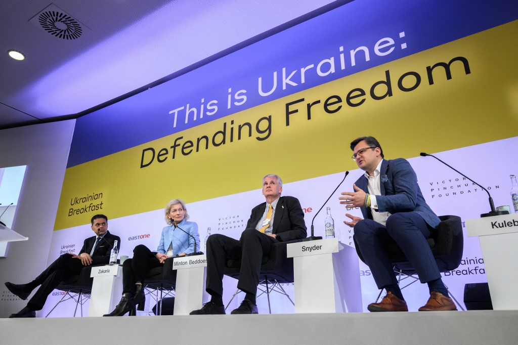 Panelists speak at an event on the sidelines of the World Economic Forum in Davos, Switzerland, on 25 May 2022 (AFP)